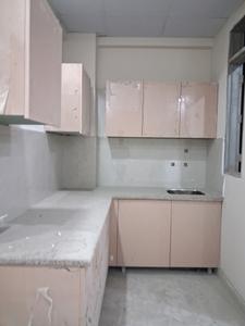 Kitchen Image of 980 Sq.ft 2 BHK Apartment / Flat for sale in GCM Gomati Apartment, Sector 49 Noida for Rs. 4125000