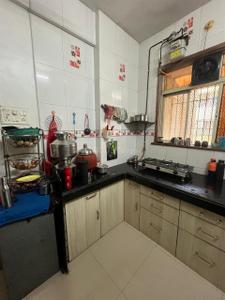 Kitchen Image of 930 Sq.ft 2 BHK Apartment / Flat for sale in Thakurli Thane for Rs. 6900000