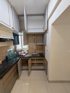 Kitchen Image of 601 Sq.ft 1 BHK Apartment / Flat for rent in Olympia Opaline, Navalur Chennai for Rs. 29000