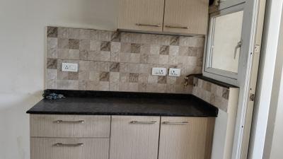 Kitchen Image of 950 Sq.ft 1 BHK Apartment / Flat for rent in Puravankara Purva Silversands Phase 1 Building 4 To 9, Mundhwa Pune for Rs. 24000