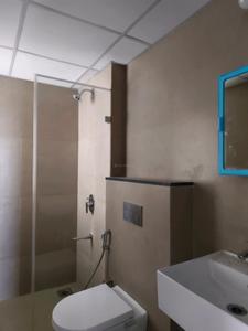 Common Bathroom Image of 1200 Sq.ft 3 BHK Apartment / Flat for rent in Runwal The Central Park Phase I, Chinchwad Pune for Rs. 46000