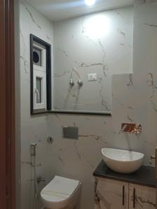 Common Bathroom Image of 600 Sq.ft 2 BHK Builder Floor for rent in Dwarka Mor New Delhi for Rs. 19000