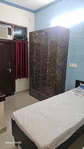Bedroom Image of Dheeraj PG in Sector 19, Noida