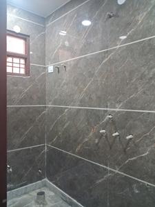 Common Bathroom Image of 560 Sq.ft 2 BHK Builder Floor for rent in Aman Floors, Sector 24 Rohini New Delhi for Rs. 18000