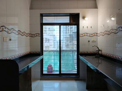 Kitchen Image of 713 Sq.ft 1 BHK Apartment / Flat for sale in Pushpak Nagar Navi Mumbai for Rs. 4650000
