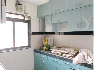 Kitchen Image of 899 Sq.ft 2 BHK Apartment / Flat for rent in ACME Ozone by Acme Group, Thane West Thane for Rs. 36000