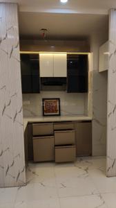 Kitchen Image of 550 Sq.ft 2 BHK Apartment / Flat for sale in Dwarka Mor New Delhi for Rs. 4500000