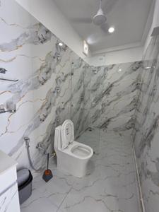 Bathroom Image of 550 Sq.ft 1 RK Builder Floor for rent in DLF Capital Greens Phase III, Karampura New Delhi for Rs. 23500