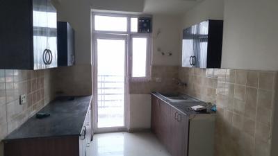 Kitchen Image of 949 Sq.ft 2 BHK Apartment / Flat for rent in Gardenia Glory, Sector 46 Noida for Rs. 30000