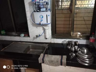 Kitchen Image of SAI RAM PG  in Kopar Khairane, Navi Mumbai