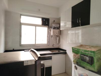 Kitchen Image of 566 Sq.ft 1 BHK Apartment / Flat for sale in Thakur Galaxy, Boisar Mumbai for Rs. 2200000