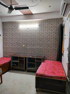 Bedroom Image of Mishra PG in Sewa Nagar, Ghaziabad