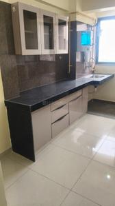 Kitchen Image of 730 Sq.ft 1 BHK Apartment / Flat for rent in Palash Homes, Sarkhej Ahmedabad for Rs. 23000