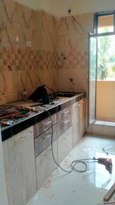 Kitchen Image of 690 Sq.ft 1 BHK Apartment / Flat for sale in Sai Gangat Apartment, Kasarvadavali Thane for Rs. 4300000