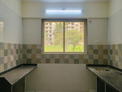 Kitchen Image of 600 Sq.ft 1 BHK Apartment / Flat for sale in Patels Eternity, Ambernath West Ambernath for Rs. 2450000