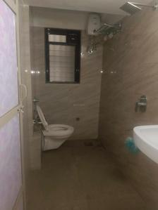Common Bathroom Image of 900 Sq.ft 2 BHK Apartment / Flat for rent in Sheth Vasanth Utsav Complex, Kandivali East Mumbai for Rs. 58000