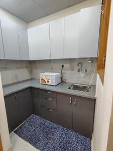 Kitchen Image of 500 Sq.ft 1 BHK Builder Floor for rent in Sector 57 Gurgaon for Rs. 35000
