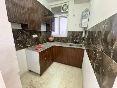 Kitchen Image of 845 Sq.ft 2 BHK Apartment / Flat for rent in Amrapali Riverview, Noida Extension Greater Noida for Rs. 18000