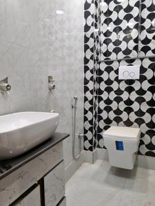 Common Bathroom Image of 750 Sq.ft 3 BHK Apartment / Flat for sale in Dwarka Mor New Delhi for Rs. 4300000