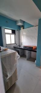 Kitchen Image of 550 Sq.ft 1 BHK Apartment / Flat for sale in Puraniks Home Town, Kasarvadavali Thane for Rs. 5600000