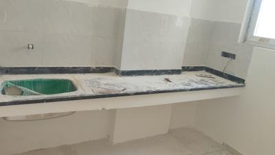 Kitchen Image of 730 Sq.ft 1 BHK Apartment / Flat for sale in Sri Sri Aero City, Bongloor Hyderabad for Rs. 3300000