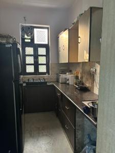 Kitchen Image of 850 Sq.ft 2 BHK Builder Floor for rent in Sector 24 Rohini New Delhi for Rs. 20000