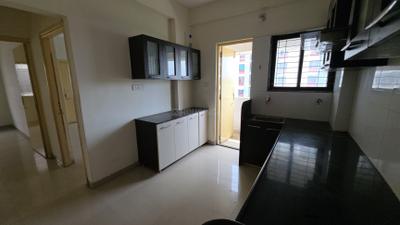 Kitchen Image of 1100 Sq.ft 2 BHK Apartment / Flat for rent in Suncity Exotica, Vishwamitri Vadodara for Rs. 12000
