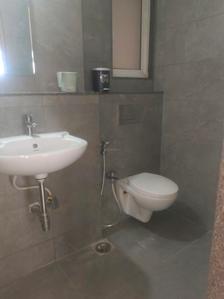Common Bathroom Image of 550 Sq.ft 1 BHK Apartment / Flat for sale in Godrej Nest, Kandivali East Mumbai for Rs. 12000000