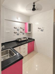 Kitchen Image of 1065 Sq.ft 2 BHK Apartment / Flat for sale in Chala Vapi for Rs. 3500000