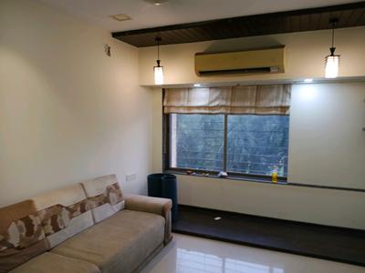 Living Room Image of 965 Sq.ft 2 BHK Apartment / Flat for rent in Ajmera Cosmic Heights, Wadala East Mumbai for Rs. 73000