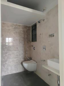 Common Bathroom Image of 780 Sq.ft 1.5 BHK Apartment / Flat for sale in Rajhans Moonstone, Vasai West Vasai for Rs. 7800000