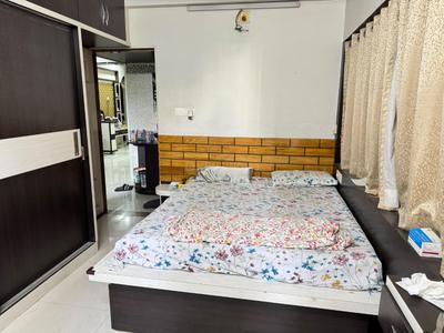 Bedroom Image of 800 Sq.ft 2 BHK Apartment / Flat for rent in Sola Ahmedabad for Rs. 25000