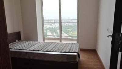 Bedroom Image of 975 Sq.ft 2 BHK Apartment / Flat for rent in Godrej The Suites, Jaypee Greens Greater Noida for Rs. 38000