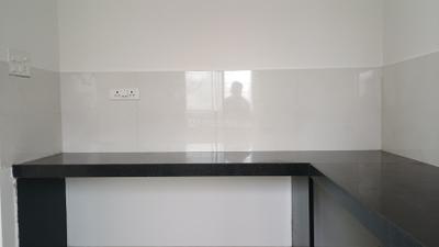 Kitchen Image of 1025 Sq.ft 2 BHK Studio for sale in R R Isle Of Life Building B And C, Marunji Pune for Rs. 7200000