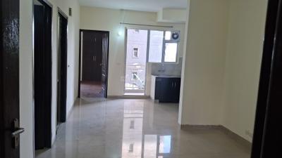 Living Room Image of 511 Sq.ft 2 BHK Apartment / Flat for rent in Aditya Urban Homes, Bamheta Village Ghaziabad for Rs. 14000