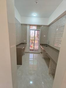 Kitchen Image of 670 Sq.ft 1 BHK Apartment / Flat for sale in Kulswamini Brahmand Wing B Janai Shankar, Thakurli Thane for Rs. 4800000