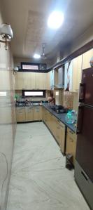 Kitchen Image of 1100 Sq.ft 3 BHK Independent House for rent in Tagore Garden Extension New Delhi for Rs. 45000
