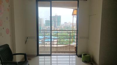 Living Room Image of 733 Sq.ft 1 BHK Apartment / Flat for sale in Vastusankalp Punyodaya Rio Type A, Kalyan West Kalyan for Rs. 5200000