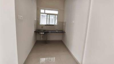 Kitchen Image of 520 Sq.ft 2 BHK Apartment / Flat for rent in Kolte Patil Life Republic Sector R35 35th Avenue Harmony, Mulshi Kh. Pune for Rs. 21000