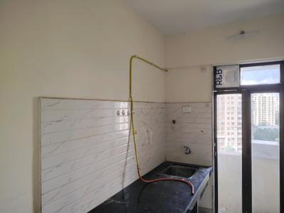 Kitchen Image of 750 Sq.ft 1 BHK Apartment / Flat for rent in Bhagwati Belmont, Kasarvadavali Thane for Rs. 18258