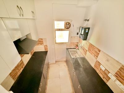 Kitchen Image of 899 Sq.ft 2 BHK Apartment / Flat for rent in Amrapali Enchante, Noida Extension Greater Noida for Rs. 18000