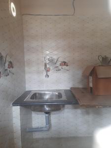 Kitchen Image of 600 Sq.ft 1 RK Independent House for rent in Halasuru Bengaluru for Rs. 24000