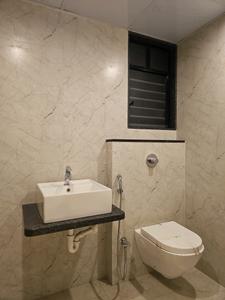 Common Bathroom Image of 1475 Sq.ft 3 BHK Apartment / Flat for sale in Kohinoor Viva Pixel Phase 2, Dhanori Pune for Rs. 9889758