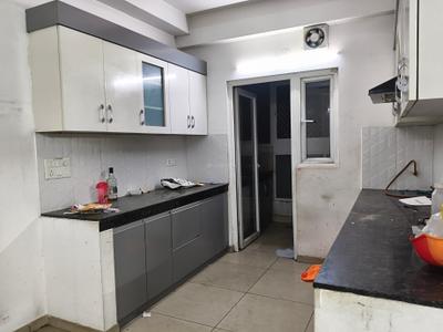 Kitchen Image of 1340 Sq.ft 3 BHK Apartment / Flat for rent in Gulshan Ikebana, Sector 143 Noida for Rs. 32000