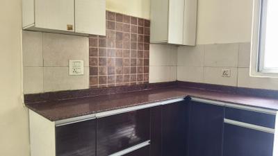Kitchen Image of 1000 Sq.ft 2.5 BHK Apartment / Flat for sale in Amrapali Zodiac, Sector 120 Noida for Rs. 10000000