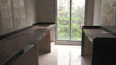 Kitchen Image of 939 Sq.ft 2 BHK Apartment / Flat for sale in Prithvi Aarna, Ulwe Navi Mumbai for Rs. 9500000