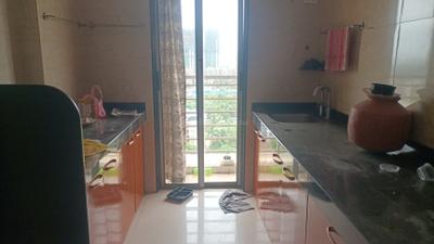 Kitchen Image of 733 Sq.ft 1 BHK Apartment / Flat for sale in Vastusankalp Punyodaya Rio Type A, Kalyan West Kalyan for Rs. 5200000