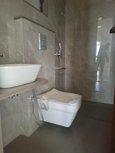 Common Bathroom Image of 1050 Sq.ft 2 BHK Apartment / Flat for sale in Planet Venus, Kamothe Navi Mumbai for Rs. 11800000