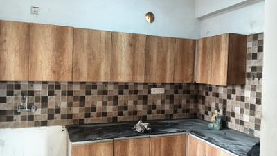Kitchen Image of 910 Sq.ft 2.5 BHK Apartment / Flat for rent in Prateek Grand City, Siddharth Vihar Ghaziabad for Rs. 26500