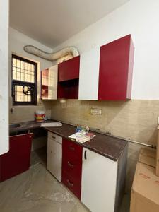 Kitchen Image of 650 Sq.ft 2 BHK Builder Floor for rent in Sector 3 Rohini New Delhi for Rs. 22000